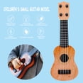 thumbnail image 4 of Juguete para niños modelo de guitarra pequeña portátil para exhibición de festivales amarillo, 4 of 6