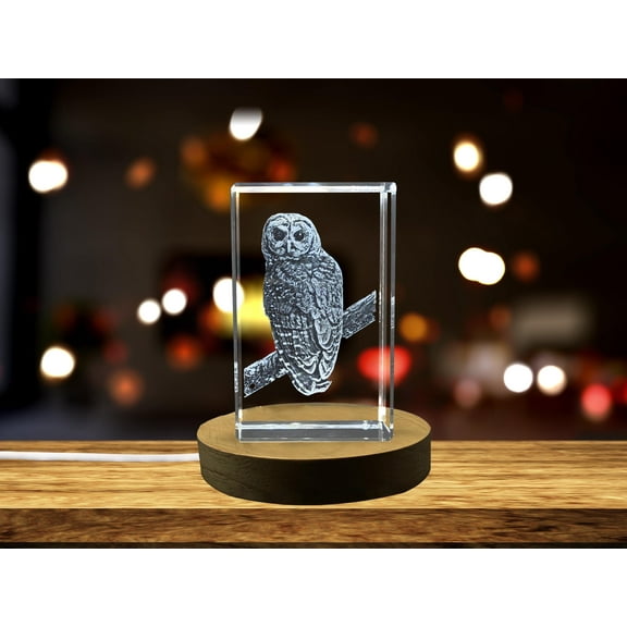 A stunning spotted owl carved crystal sculpture gift