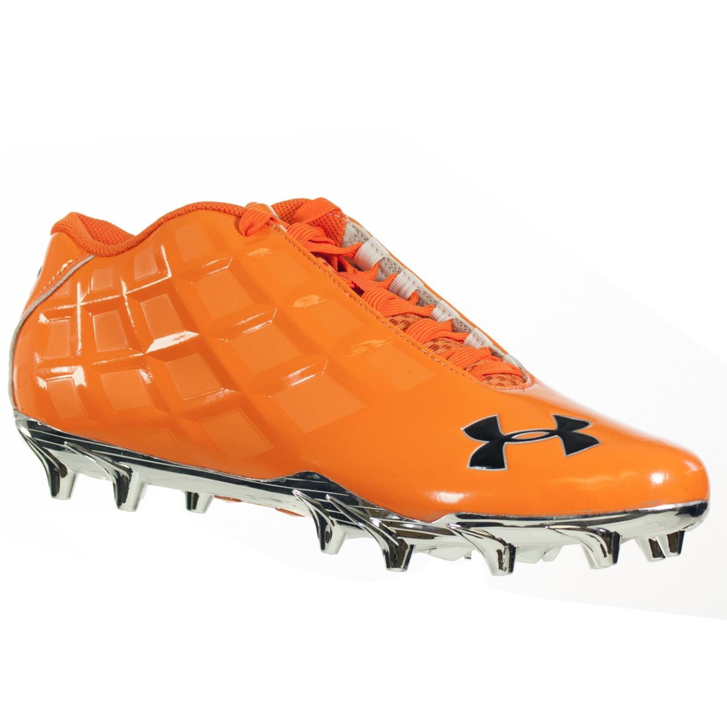 orange and black under armour football cleats