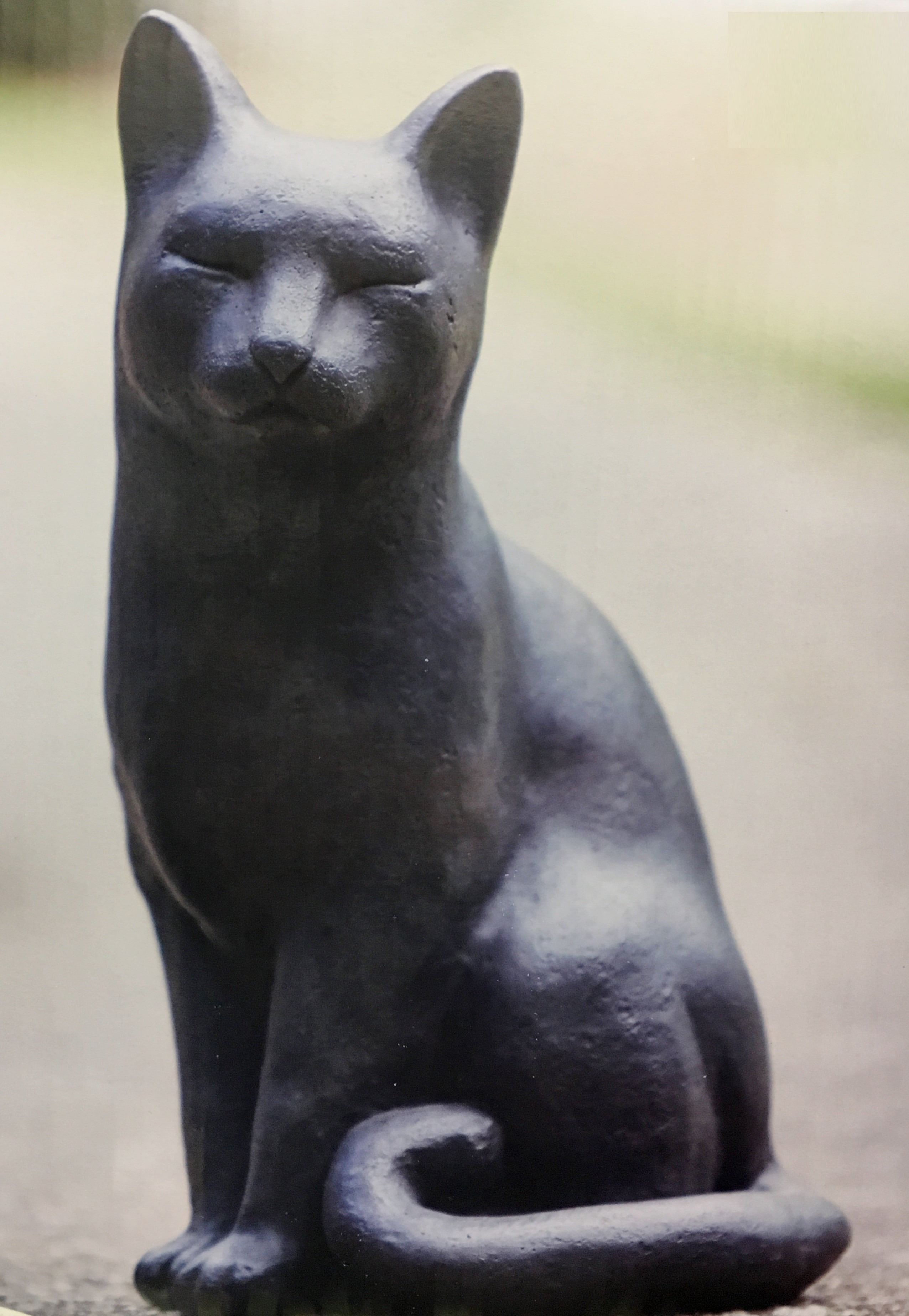 black cat outdoor statue