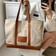 thumbnail image 5 of Bolso grande de lona para mujer, bolso de hombro informal con cremallera y bolsillo para viajes, playa, trabajo, compras, 5 of 5