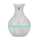thumbnail image 1 of Xihbxyly Difusor de Aceite Led, Humidificador de Aromaterapia, 7 Luces Que Cambian de Color, Funcionamiento Silencioso, Ideal para Dormitorio, Oficina, Spa, Capacidad de 130 Ml, Diseño de Veta de Mad, 1 of 4