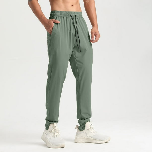 Pantalones largos para hombre, casuales, de moda, de color sólido, con cordón, cintura elástica y bolsillos.