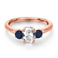 thumbnail image 3 of Gem Stone King 18K Rose Gold Plated Silver White Created Sapphire and Blue Sapphire Engagement Ring for Women | 1.44 Cttw | Oval 7X5MM | Gemstone September Birthstone | Size 9, 3 of 6