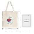 thumbnail image 3 of Stylish canvas tote bag featuring a pixelated red hat on a white print perfect for shopping travel and parties, 3 of 4