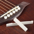 thumbnail image 2 of Tuerca de sillín de puente de hueso de guitarra acústica hecha de accesorios de guitarra de hueso Real Eigraketly EL010545-00, 2 of 5