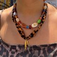 thumbnail image 4 of PISONIC Women Vintage Leopard Print Ribbon Beaded Necklace, Multicolor Stone‑Look Beads with Gold‑Tone Double Fish Pendant Statement Collar Necklace, 4 of 7