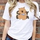 thumbnail image 3 of Playera Blusa De Capybara Con Paliacate Diseño Divertido Ropa Para Mujer Capibara Color Blanco Talla Grande Marca Emil SaEs, 3 of 4