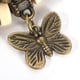 thumbnail image 3 of Reloj de pulsera analógico de cuarzo con pulsera de PU con tejido trenzado y colgante de mariposa (correa de café), 3 of 5
