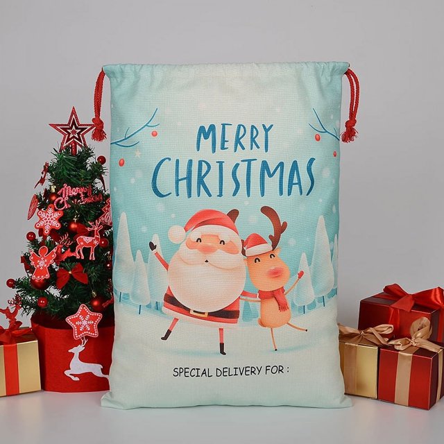 Venta al por mayor de sacos navideños de Papá Noel 2023 con cordón 50x70, saco rojo suave de Papá Noel para niños con cuerda