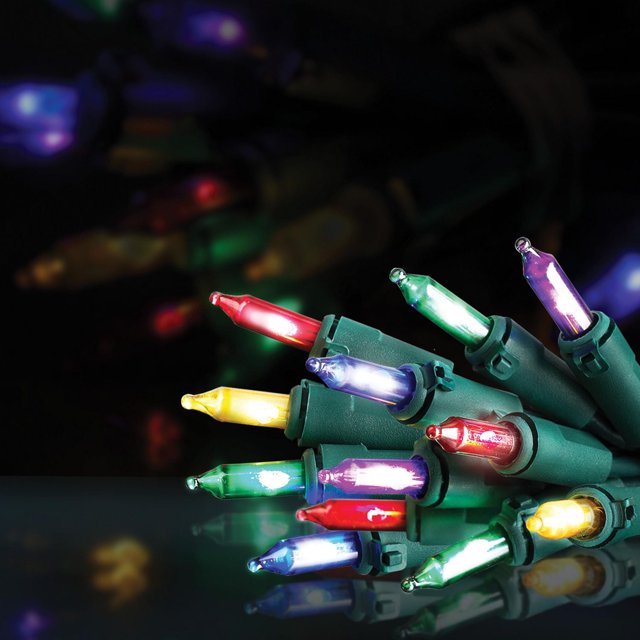 2 Sets of 100 mini glass incandescent look indoor/outdoor LED light strings with green wire featuring multicolor bulbs in red, yellow, green, blue, and purple clustered on a reflective surface against a dark background, suitable for festive outdoor and indoor decoration.