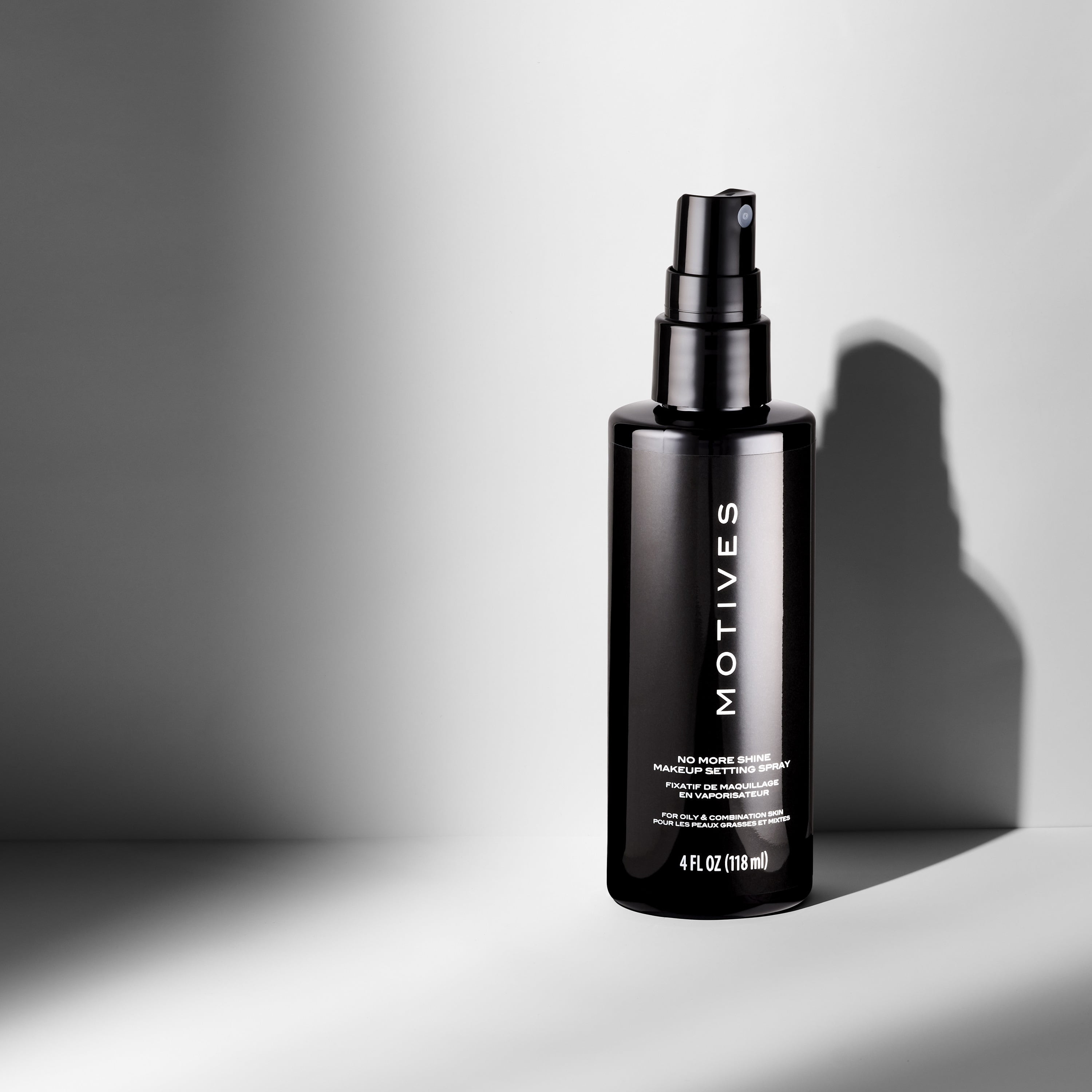 Motives No More Shine Makeup Setting Spray, 4 fl oz, Long-Lasting Oil Control Mist for Matte Finish & Shine-Free Makeup Hold