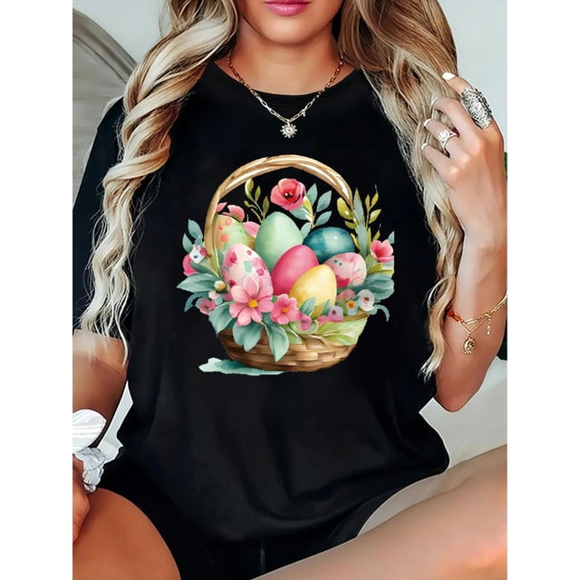 Camiseta informal negra para mujer con estampado de huevos de Pascua coloridos y cesta floral. Manga corta, cuello redondo, corte holgado y extragrande. Ideal como regalo de primavera/verano. Camiseta