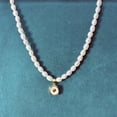 thumbnail image 2 of Elegant White Freshwater Pearl Necklace with Open Gold Heart Pendant and Heart-Shaped Gemstone – Timeless Jewelry Piece, 2 of 6