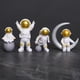 thumbnail image 3 of 4 piezas de estatua de astronauta, figura decorativa, estantería, figura de astronauta Oro blanco, 3 of 6