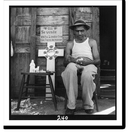 Historic Print, [Catholic religious scenes in Puerto Rico, 1944-46: man on street whittling religious figures], 18" x 24"