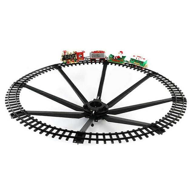 christmas train set railway train carriage toy christmas train tree decoration track electric toy ch anillo de vía plástico negro con cubo central y soportes radiales, cuatro vagones festivos (locomotora, vagón de carbón, plataforma y vagón verde) con pinturas rojas y blancas y luces integradas, mostrado ensamblado sobre fondo blanco; diseñado para rodear un árbol de Navidad y funciona con 4 pilas AA (no incluidas).