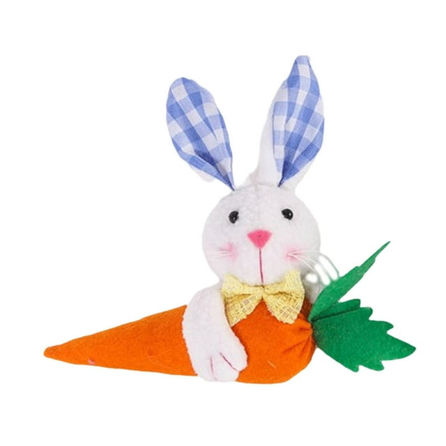 Conejito de Pascua con zanahoria como decoración de Pascua para el dormitorio del jardín. Orejas de conejito azul