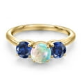 thumbnail image 3 of Gem Stone King 18K Yellow Gold Plated Silver Simulated White Opal and Blue Created Sapphire Engagement Ring for Women | 1.50 Cttw | Round Cabochon 6MM | Gemstone October Birthstone | Size 5, 3 of 6