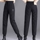 thumbnail image 1 of Pantalones de plumón de pato blanco para mujer, ropa exterior de moda, pantalones de algodón con cintura alta, gruesos, cálidos y resistentes al frío, con tobillos atados, 1 of 3