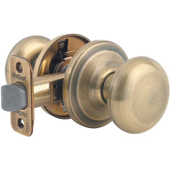Kwikset Juno Passage Knob Doorknob With Faceplate - Antique Brass Steel
