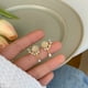 thumbnail image 3 of Pendientes de clip de oreja de rosa de Versalles para mujer, estilo hada, sin perforaciones, pendientes de té para mujer, pendientes de flor de Monet de verano, no se requiere orificio:, 3 of 6