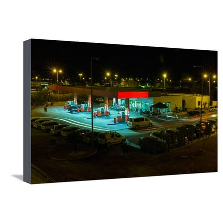 View of a Urban Gas Station Working in the Evening. Stretched Canvas Print Wall Art By Mauro