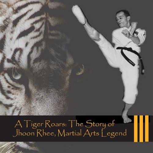 Pre-Owned A Tiger Roars: The Story of Jhoon Rhee, Martial Arts Legend Paperback Mr. Michael Shackelford