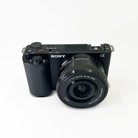 Restored Sony Alpha ZV-E10 - APS-C Interchangeable Lens Mirrorless Vlog Camera Kit - Black (Refurbished)