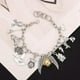 thumbnail image 2 of Pulseras Conjunto De Joyas Pulsera Ajustable con Temática De Hechicería Regalo De Cumpleaños para Niños Niñas Mujeres-Pulsera De Ala De Snitch De Metal, 2 of 3