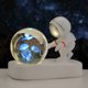thumbnail image 1 of Bola de cristal tallada con luz de noche con forma de astronauta y base luminosa para estudiantes y amigos, 1 of 6