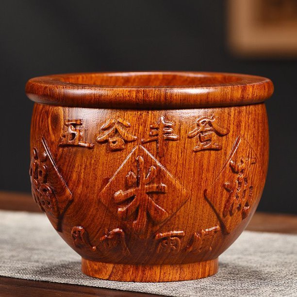Solid wood millet jar, a treasure basin carved from rosewood, a pure wood decoration for living rooms and shops.