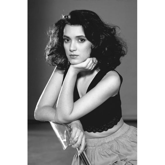 Winona Ryder 24x36 Poster beautiful young pose on chair in black top