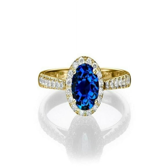 1.50 carat Oval Cut Sapphire and Diamond Halo Engagement Ring in 10k Yellow Gold