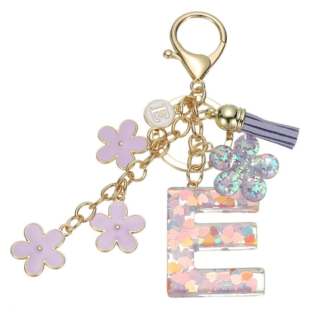 Llave de letra inicial Uxcell, llavero de borlas de flor de cerezo, encanto de llavero de letra con colgante de flor letra E púrpura