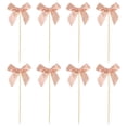 thumbnail image 2 of Contenido del paquete: Incluye un juego de decoraciones para cupcakes con forma de lazo, que agregarán encanto a su fiesta de cumpleaños o boda con temática de mariposas., 2 of 8
