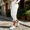 White, variant on WIZUTIZ Women's Solid Color High Rise Cropped Jogger Pants with Decorative Buttons Elastic Waist Side Pockets Tapered Ankle Casual Trousers Soft Stretchy