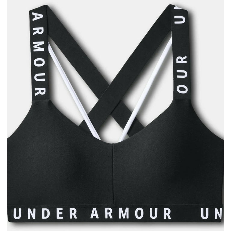 White Under Armor sports bra with black accents. - Depop