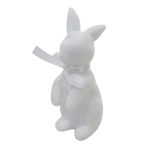 figura de conejito flocado decoración de pascua decoración de interior 21,5 cm con lazo figura de conejito flocado blanco, vista frontal centrada, sentado con silueta redondeada y textura flocada (espuma), lazo satinado blanco al cuello, medidas 21,5 x 9 cm; apta como adorno o centro de mesa para celebraciones de Pascua.
