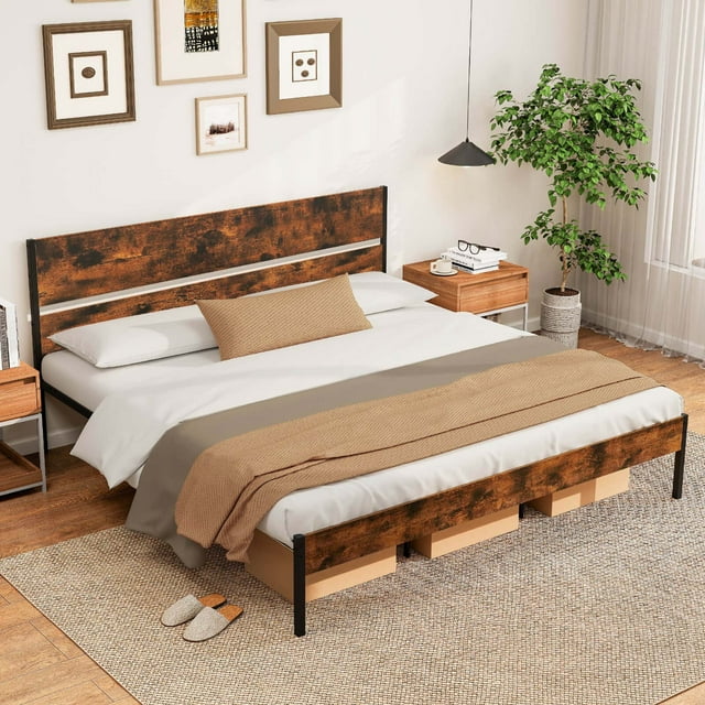 Costway King Size Bed Frame with Wooden Headboard and under-bed storage, designed as an industrial platform bed with a rustic brown engineered wood headboard and footboard complemented by a black powder-coated metal frame. The sturdy metal slats provide excellent mattress support, eliminating the need for a box spring. With 12.5 inches of under-bed clearance, it offers ample storage space. The bed frame features non-slip foot pads for floor protection and an easy buckle design for quick assembly. Displayed in a cozy bedroom with neutral decor and natural lighting.
