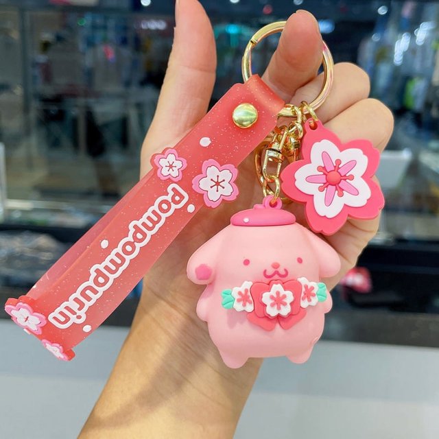 Llavero con melodía de Hello Kitty de dibujos animados encantador con colgante de Sakura llavero de muñeco 3D venta al por mayor bolso personalizado decoración regalo para niña