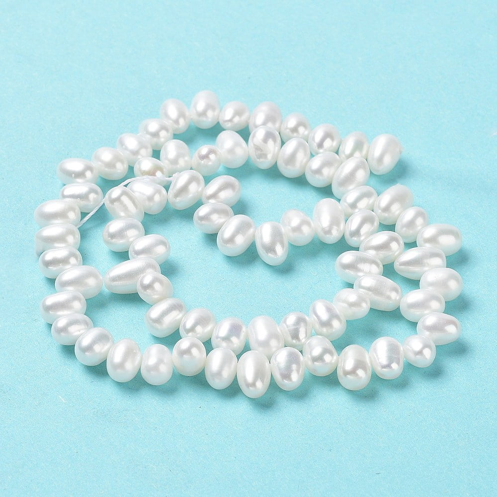 1strand Natural Cultured Freshwater Pearl Beads Strands Grade 6A+ Rice Seashell color 7~8x4~5mm Hole: 0.5mm about 70pcs/strand 13.66''(34.7cm)