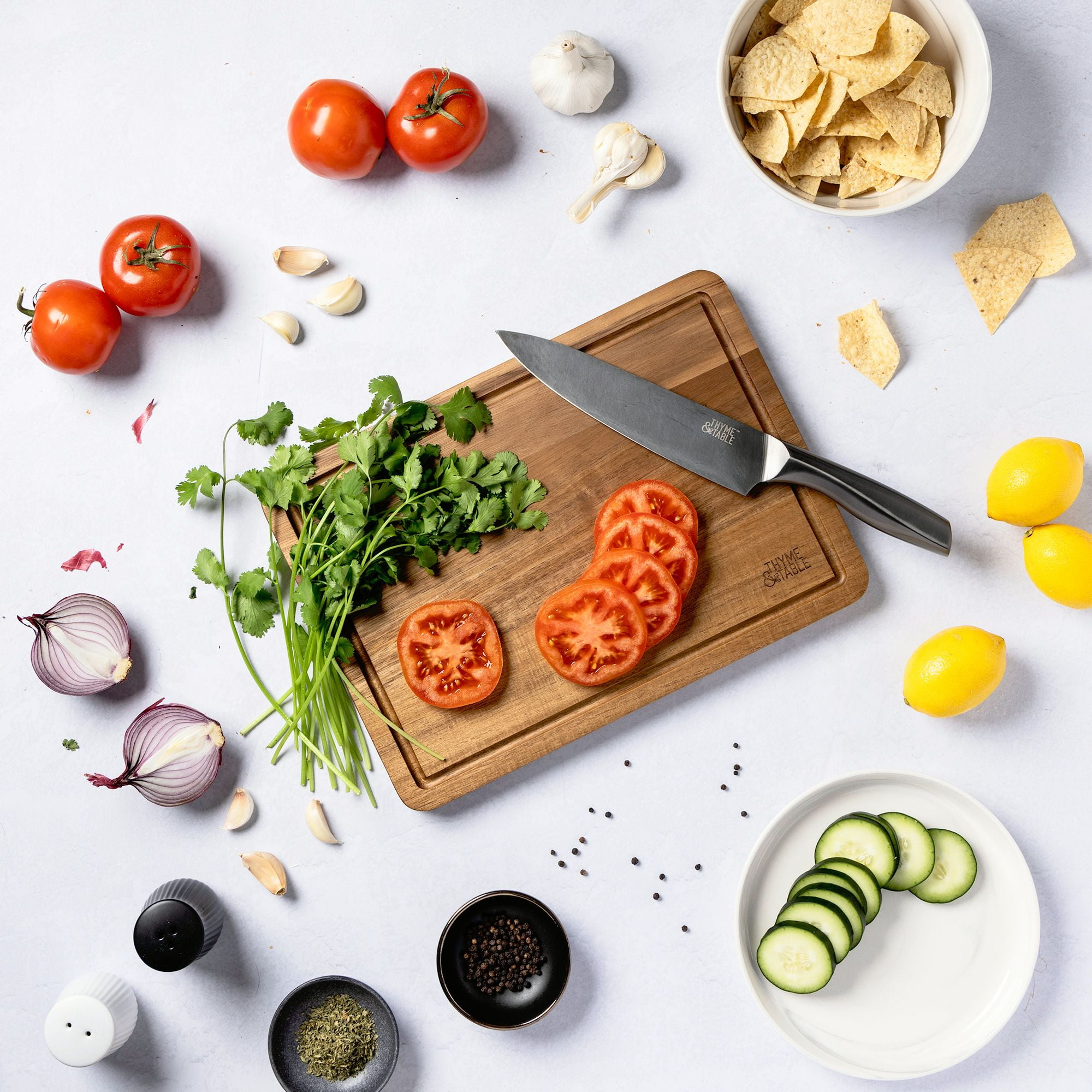 Thyme & Table Medium 10"x14" Acacia Wood Cutting Board with Triangle Shaped Anti-Slip Feet