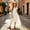 White, variant on Fesfesfes Girls Square Neck Flutter Sleeve Maxi Dress with Tie Waist Crisscross Detail, Flowy Chiffon Long Summer Outfit for Vacation and Special Occasions, Kids Ages 5-14 Years