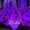 Purple, variant on Giant outdoor Halloween spider web decoration, including one blacklight and ten ground stakes; made from highly elastic mesh fabric that allows for flexible, customizable stretching—perfect for decor