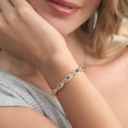 thumbnail image 3 of Gem Stone King 18K Yellow Gold Plated Silver Graduated Oval Persian Blue Moissanite Tennis Bracelet for Women (8.55 Cttw, Oval 6X4MM), 3 of 5