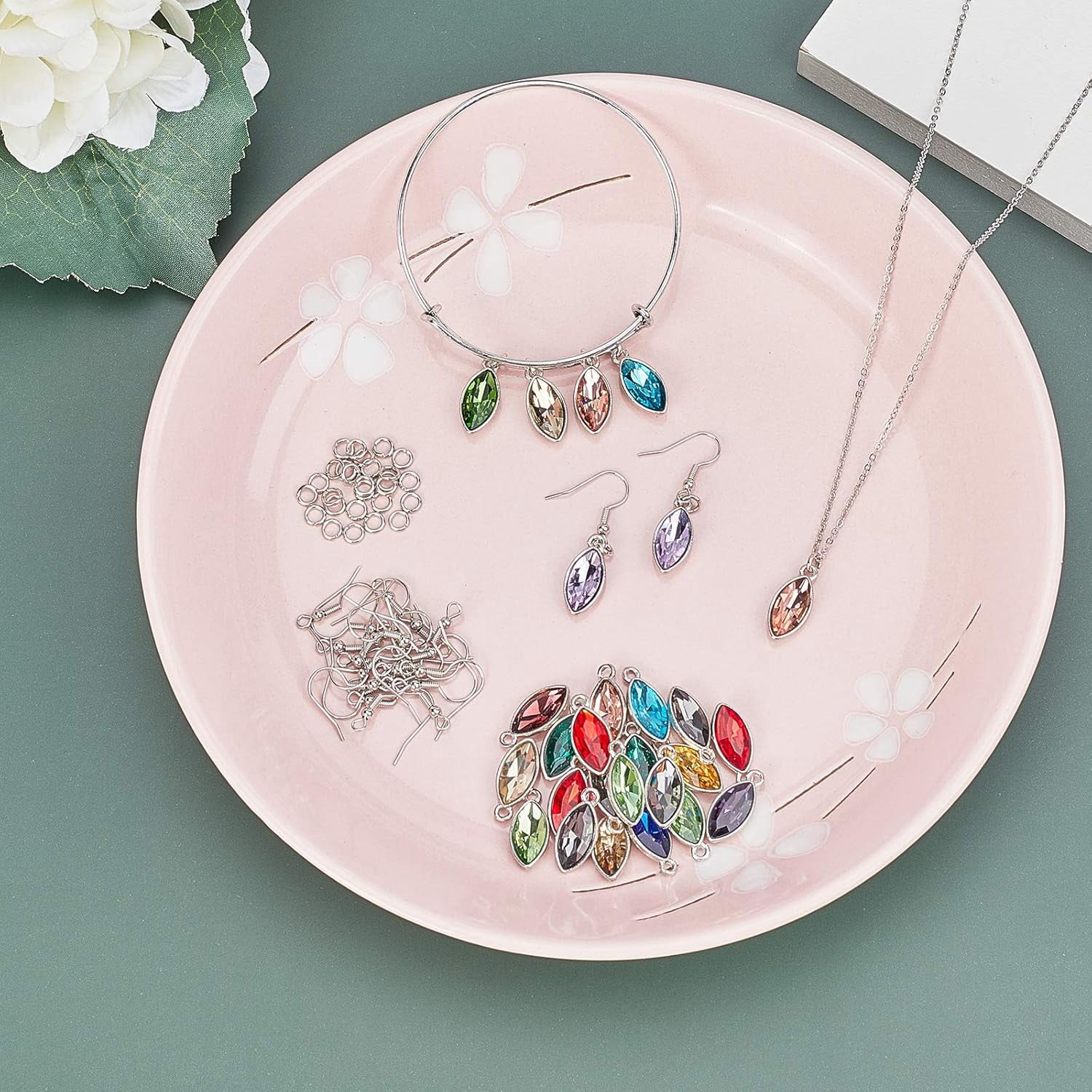 About 64pcs Alloy Glass Horse Eyes Charms with 10pcs Iron Expandable Bangles 5pcs Cable Chain Necklaces 70pcs Earring Hooks 70pcs Jump Rings for DIY Jewelry Making