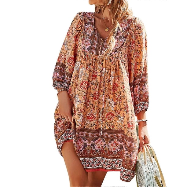 Vestido corto informal de manga tres cuartos con estampado floral, cintura holgada y escote en V, ideal para uso diario.