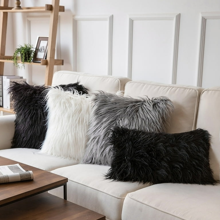 Black faux fur cushion covers top
