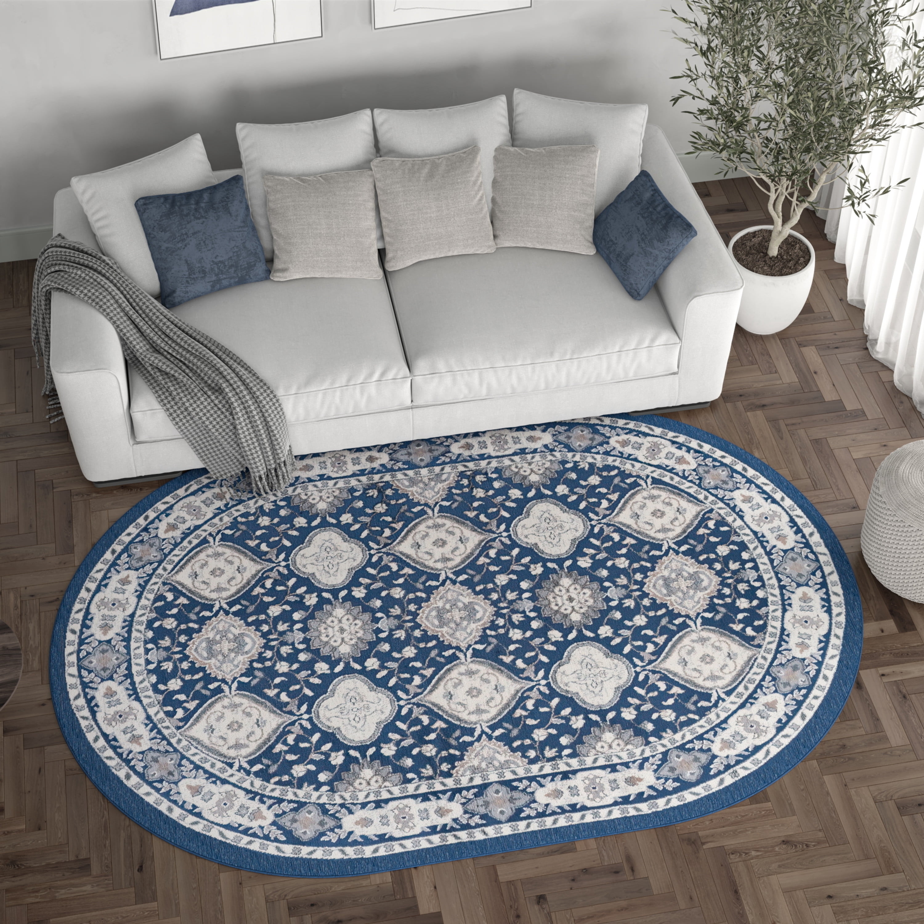 Madison Traditional 5' x 7' Oval Navy and Cream Polypropylene Indoor Area Rug